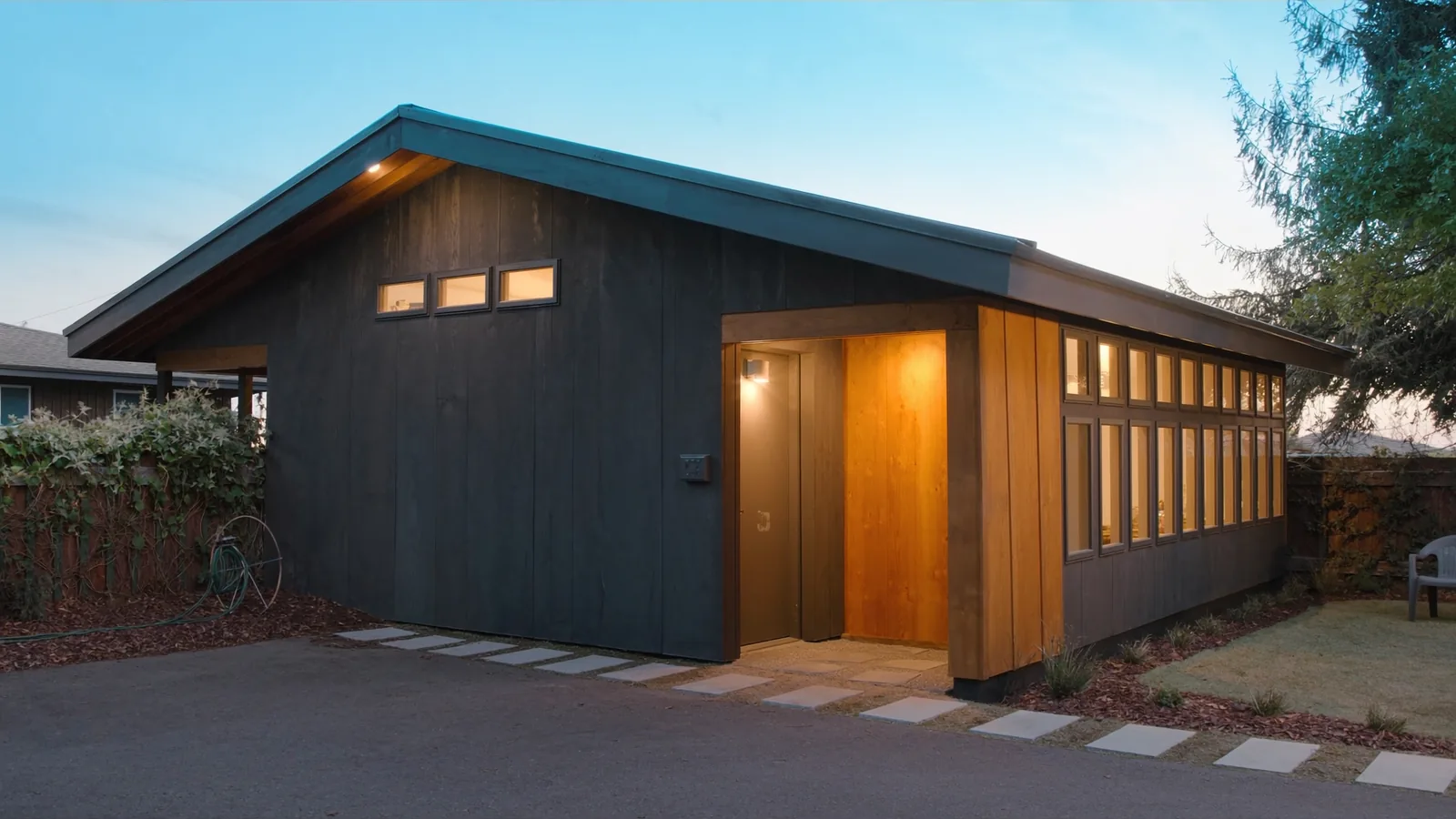 The same structure after permitted conversion — finished ADU with private entrance, kitchen, and full bath